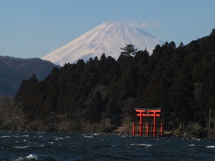 Lake and Shinto Torii gate in front of Mount Fuji